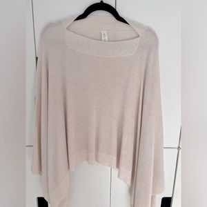 Lululemon poncho style. Very light dusty pink. Light weight. Good for layering